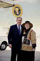 President George W. Bush met Billiee Pendleton-Parker upon arrival in Atlanta, Georgia, on Thursday, January 15, 2004.  Pendleton-Parker has been an active volunteer with Hands On Atlanta for the past four years.