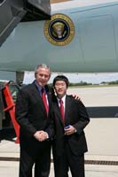 President George W. Bush presented the President’s Volunteer Service Award to David Trinh, 17, upon arrival at the airport in Erlanger, Kentucky, on Friday, May 19, 2006.  Trinh is a volunteer with The Bethany Group, a community service organization founded and operated by youth volunteers.  To thank them for making a difference in the lives of others, President Bush honors a local volunteer, called a USA Freedom Corps greeter, when he travels throughout the United States.   President Bush has met with more than 500 individuals, like Trinh, since March 2002.