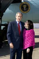 President George W. Bush presented the President’s Volunteer Service Award to Katya Lyzhina upon arrival in Little Rock, Arkansas, on Friday, February 4, 2005.  Lyzhina, 15, and a ninth-grader at North Little Rock High School, East Campus, is an active volunteer with a number of organizations in her community.  