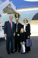 President George W. Bush met Blake and Mona Schomas upon arrival in Wilkes-Barre, Pennsylvania, on Wednesday, October 6, 2004.  The Schomases founded Home of Their Own, a sterile home environment where families can reside, free of charge, while their children recover from bone marrow transplant surgery.