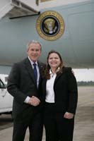 President George W. Bush presented the President’s Volunteer Service Award to Angela Schminke, upon arrival in Hampton, Virginia, on Sunday, May, 13, 2007.  Schminke is a volunteer with the Hampton Roads Chapter of the American Red Cross and the Freedom Life Church.  To thank them for making a difference in the lives of others, President Bush honors a local volunteer when he travels throughout the United States.  President Bush has met with more than 575 individuals around the country, like Schminke, since March 2002.