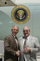President George W. Bush presented the President’s Volunteer Service Award to Joe Graff upon arrival in Ontario, California, on Monday, August 29, 2005.  Graff has volunteered more than 4,500 hours with a variety of community organizations including the Ontario Police Department, the San Bernardino Sheriff’s Department, and the Travelers Aid program at the Ontario Airport.  To thank community volunteers for making a difference in the lives of others, President Bush greets an outstanding local volunteer when Air Force One arrives at cities across the country.  Graff is the 450th volunteer to greet the President since March 2002.