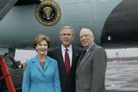 President George W. Bush met Norm Thal upon arrival in Toledo, Ohio, on Friday, October 29, 2004.  Thal, 72, is an active volunteer with SCORE, a volunteer management counseling program sponsored by the U.S. Small Business Administration.