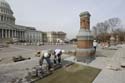 Masons set pavers on the East Front Plaza