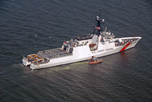 A 45-foot Coast Guard Response Boat-Medium from Station Little Creek, Va., transfers passengers from the National Security Cutter Bertholf as it transits through the Chesapeake Bay, Va.