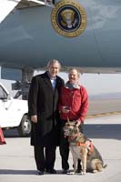 President George W. Bush presented the President’s Volunteer Service Award to Mark Polakoff upon arrival at the airport in Billings, Montana, on Thursday, November 2, 2006.  Polakoff is a volunteer with Absaroka Search Dogs.  To thank them for making a difference in the lives of others, President Bush honors a local volunteer, called a USA Freedom Corps Greeter, when he travels throughout the United States.  President Bush has met with more than 550 individuals around the country, like Polakoff, since March 2002.