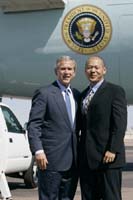President George W. Bush met Marcelo Chan upon arrival in Phoenix, Arizona, on Tuesday, October 12, 2004.  Chan is an active volunteer with MentorKids USA.