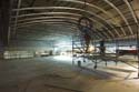 Workers continue assembling the metal framework for one of the three barrel-vaulted ceiling alcoves in the Great Hall