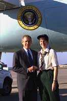 President George W. Bush met Sharon Seng upon arrival in Savannah, Georgia, on Saturday, November 2. Seng has been a part of the Girl Scouts organization as a troop member and leader for 35 years. The Girl Scouts was founded in Savannah, Georgia, in 1912, with a membership of 18 girls. 