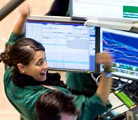 Chaotic Week Ends With Market Soaring // Lehman specialist Elizabeth Rose cheers at the NYSE (© Richard Drew/AP)