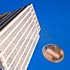 Photo illustration of penny falling from the Empire State Building (© Jeffrey Coolidge, Glowimages/Getty Images)