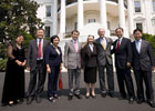 President George W. Bush poses for a photo at the South Portico entrance to the White House Tuesday, July 29, 2008, with Chinese Human Rights Activists, from left, Ciping Huang, Wei Jingsheng, Sasha Gong, Alim Seytoff, interpreter; Rebiya Kadeer, Harry Wu and Bob Fu, following their meeting at the White House. White House photo by Eric Draper 