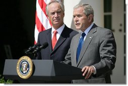 As U.S. Interior Secretary Dirk Kempthorne looks on, President George W. Bush delivers a statement on energy Wednesday, June 18, 2008, in the Rose Garden of the White House. Calling on Congress to expand domestic oil production, the President said, "For many Americans, there is no more pressing concern than the price of gasoline. Truckers and farmers and small business owners have been hit especially hard. Every American who drives to work, purchases food, or ships a product has felt the effect. And families across our country are looking to Washington for a response." White House photo by Luke Sharrett