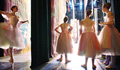 Ballet dancers prepare offstage