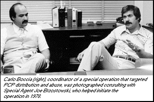 photo - Carlo Boccia, coordinator of a special operation that targeted PCP distribution and abuse was photographed consulting with Special Agent Joe Brzostowski, who helped initiate the operation in 1978.