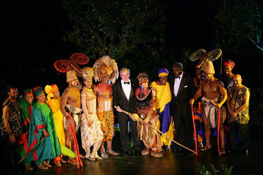President George W. Bush and President John Agyekum Kufuor of Ghana join cast members of the Lion King on stage in the Rose Garden at the White House Monday evening, Sept. 15, 2008, following their performance at the State Dinner in honor of President Kufour's visit to the United States. White House photo by Chris Greenberg