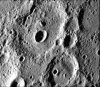 Fresh crater in center of older crater basin on Mercury