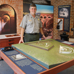 A ranger shows the new exhibits at the Fort Barrancas Visitor Center.