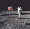 Aldrin poses with flag