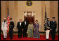 President George W. Bush and Mrs. Laura Bush pose with President John Agyekum Kufuor of Ghana and Mrs. Theresa Kufuor after their arrival at the White House Monday, Sept. 15, 2008, for a State Dinner. White House photo by Chris Greenberg