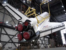 Space shuttle Endeavour is lifted.