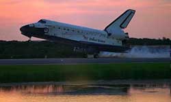 Dawn landing of a Space Shuttle at Kennedy Space Center.
