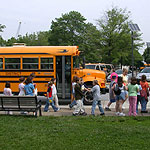 A busload of children arrive at Fort McHenry.