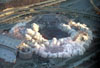 The implosion of Three Rivers Stadium in Pittsburgh, Pennsylvania, on February 11, 2001, as seen from the Goodyear blimp