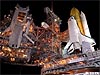 A picture taken at night of the space shuttle on the launch pad