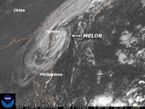 Visible satellite image of Tropical Storm Melor just east of Taiwan on November 2, 2003