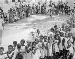 Photo: A village gathered to receive vaccinations.