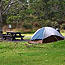 Tent and picnic table in Namakanipaio Campground