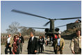 Laura Bush and U.S. Ambassador to Afghanistan Zalmay Khalilzad arrive at the Presidential Palace in Kabul, Afghanistan, Wednesday, March 30, 2005.