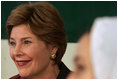 Laura Bush listens to Afghan teachers and students at the Women’s Teacher’s Training Institute of Kabul University in Kabul, Afghanistan, Wednesday, March 30, 2005. 