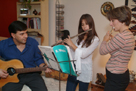 Latino family playing musical instruments