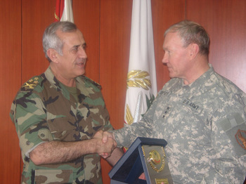 Lieutenant Gen. Martin Dempsey, Acting Commander of U.S. Central Command, shakes hands with Lt. Gen. Michel Sleiman, commander of the Lebanese Armed Forces, during a visit to Lebanon on May 14. (U.S. State Department photo)