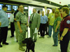 Photo of St. Louis-based TSA officers and staff receive an operations briefing at Louis Armstrong New Orleans International Airport. The St. Louis employees were deployed to the Gulf Coast in advance of Gustav.