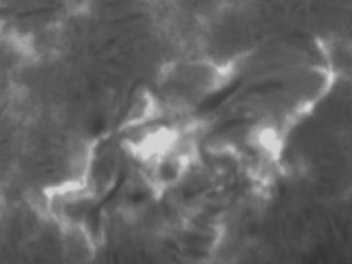 The event in Hydrogen-alpha from Big Bear Solar Observatory.  Later stage of gas ejection.