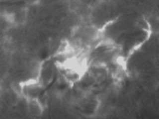 The event in Hydrogen-alpha from Big Bear Solar Observatory.  Early stage of gas ejection.