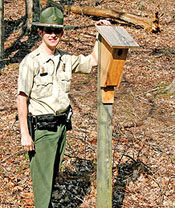 Ranger John Bass and one of the “Peterson” style bluebird boxes at Montgomery Bell State Park. Photo by Kate Hargrove.