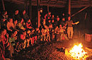 Students gather around a campfire at the Great Smoky Mountains Institute at Tremont in Townsend. Photo by J. Spencer.