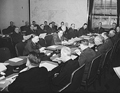 Combined Munitions Assignments Board at weekly meeting in Washington, with Chairman Harry Hopkins presiding (1943).