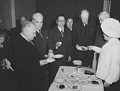 Guests at luncheon celebrating second anniversary of len-lease, on March 11, 1943, at Hotel Statler, Washington, D.C., examine dehydrated food 