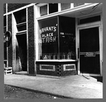 A fish restaurant for Negroes in the section of the city


     where cotton hoers are recruited, includes a sign: 'Bryant's Place


     Hot Fish for Colored.'