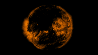 Opening view of the Sun in ultraviolet light.  Surprisingly, it is mostly dark, but for the high temperature active regions.