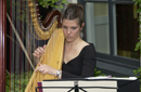 Lady playing Harp