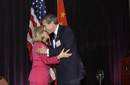 Lady greets Secy. Carlos Gutierrez at the US/China Business Council Luncheon