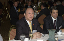 Chinese Minister listens to proceedings at the US/China Business Council luncheon