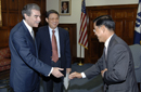 Secretary Gutierrez  greets Ambassador Zhou Wenzhong