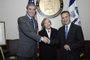 Secretary Carlos Gutierrez congratulates Assistant Secretary Chris Padilla